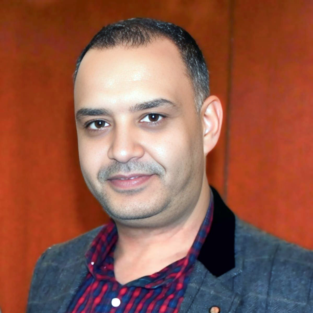 Head shot of Rasmi Khazaalah